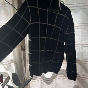 Elegant Black and White Grid Turtleneck Sweater